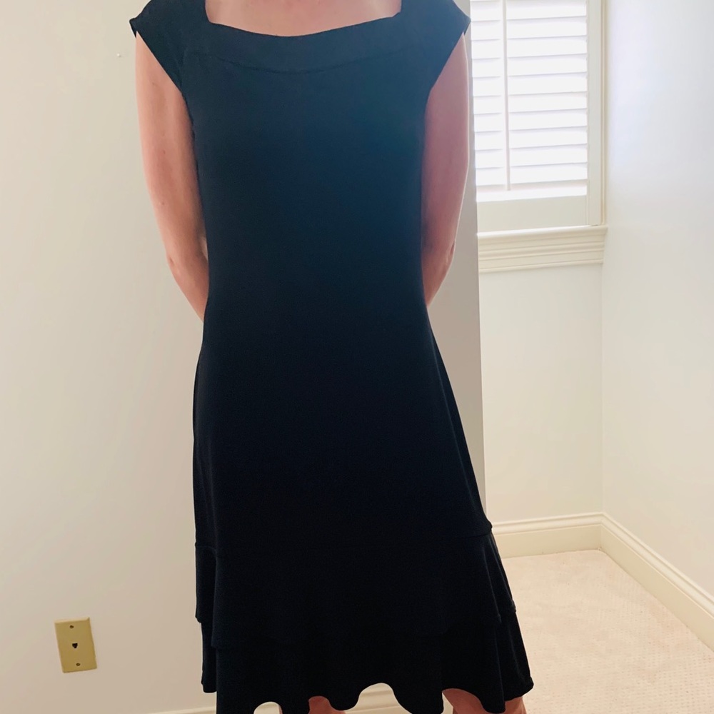 Black shirt sleeved dress.